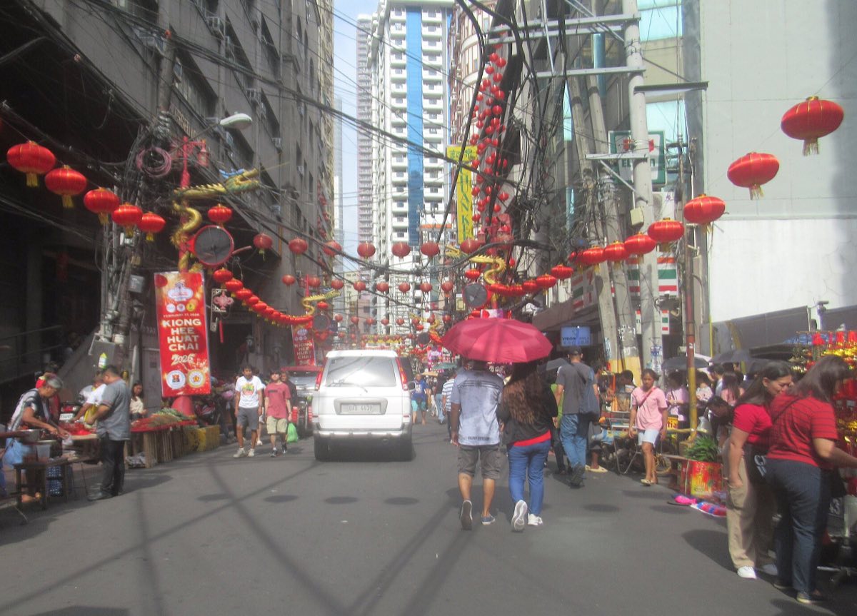 Red lanterns strung over a street in Binondo, Manila's Chinatown