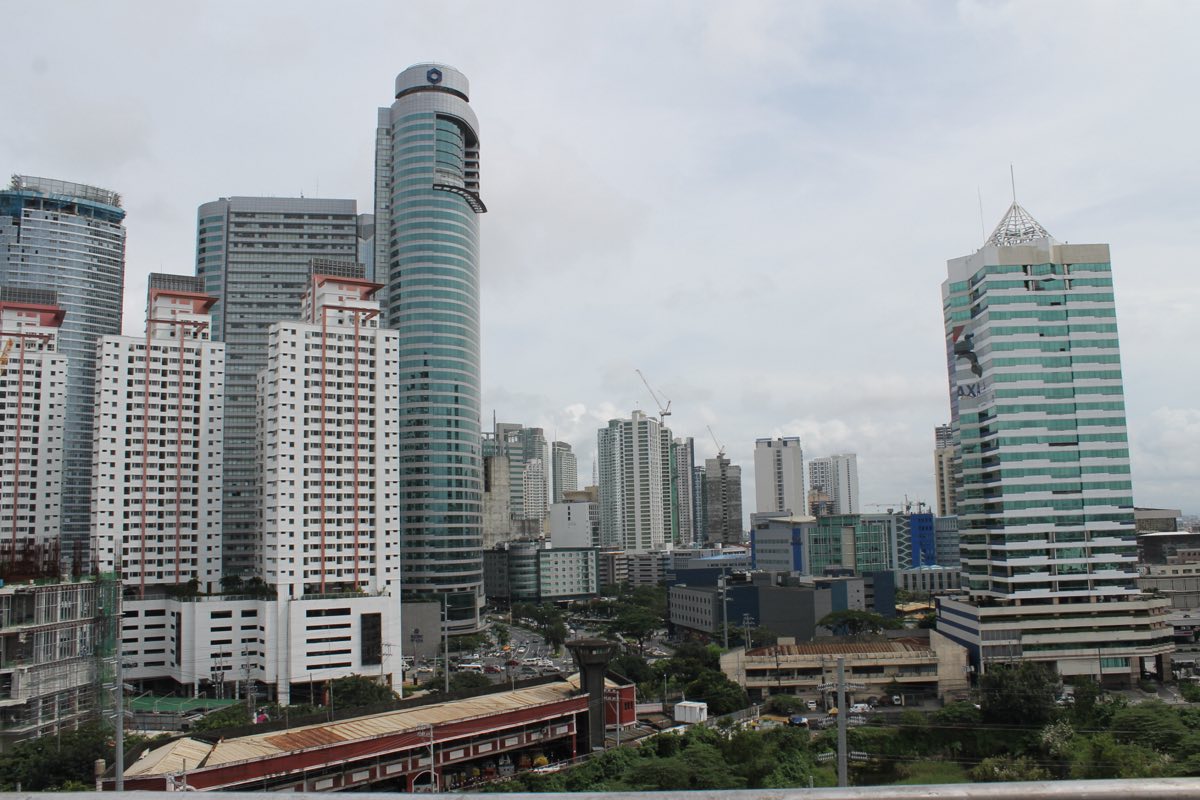 The office towers of the Makati central business district at dusk